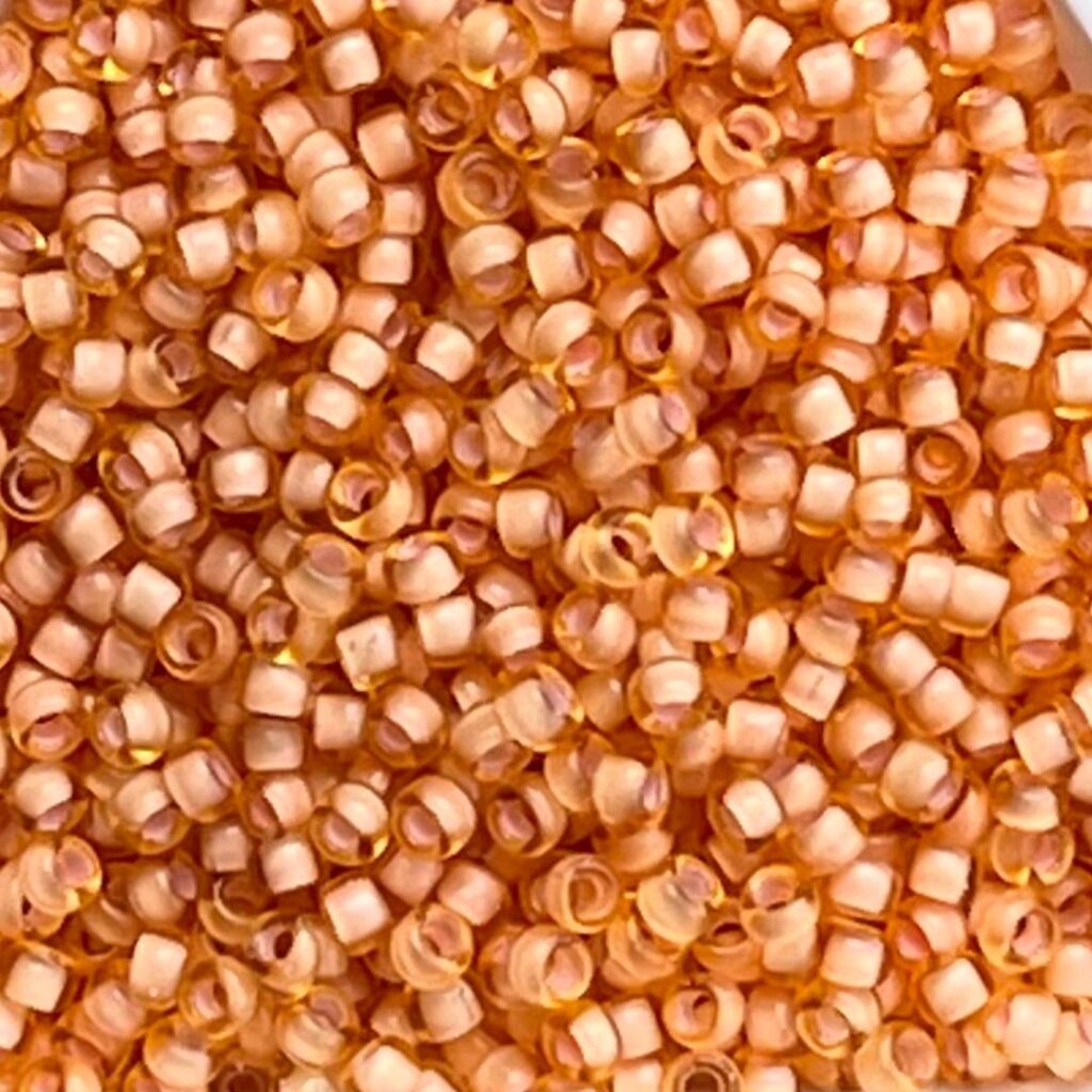 Rocalla Miyuki #11 Semi-Matte Peach Lined LT Topaz