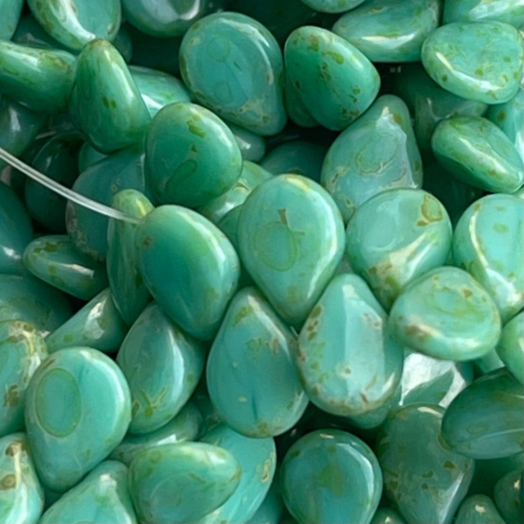 PIP 5x7mm Turquoise Alabaster Opaque Travertine 69Bds/Str - Image 1