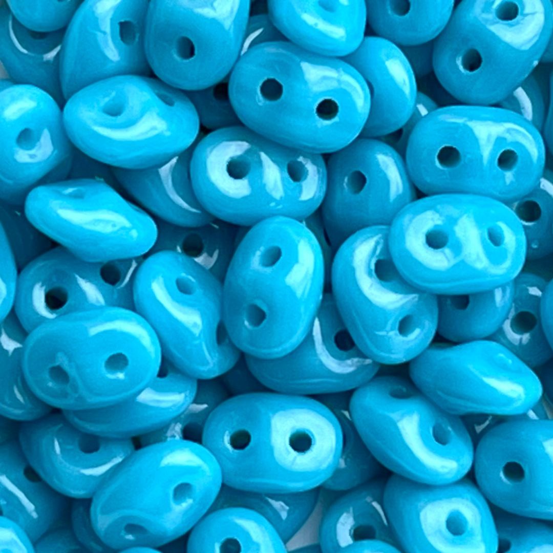 SuperDuo 2x5mm Sleeping Beauty Turquoise x 10 grs - Image 1
