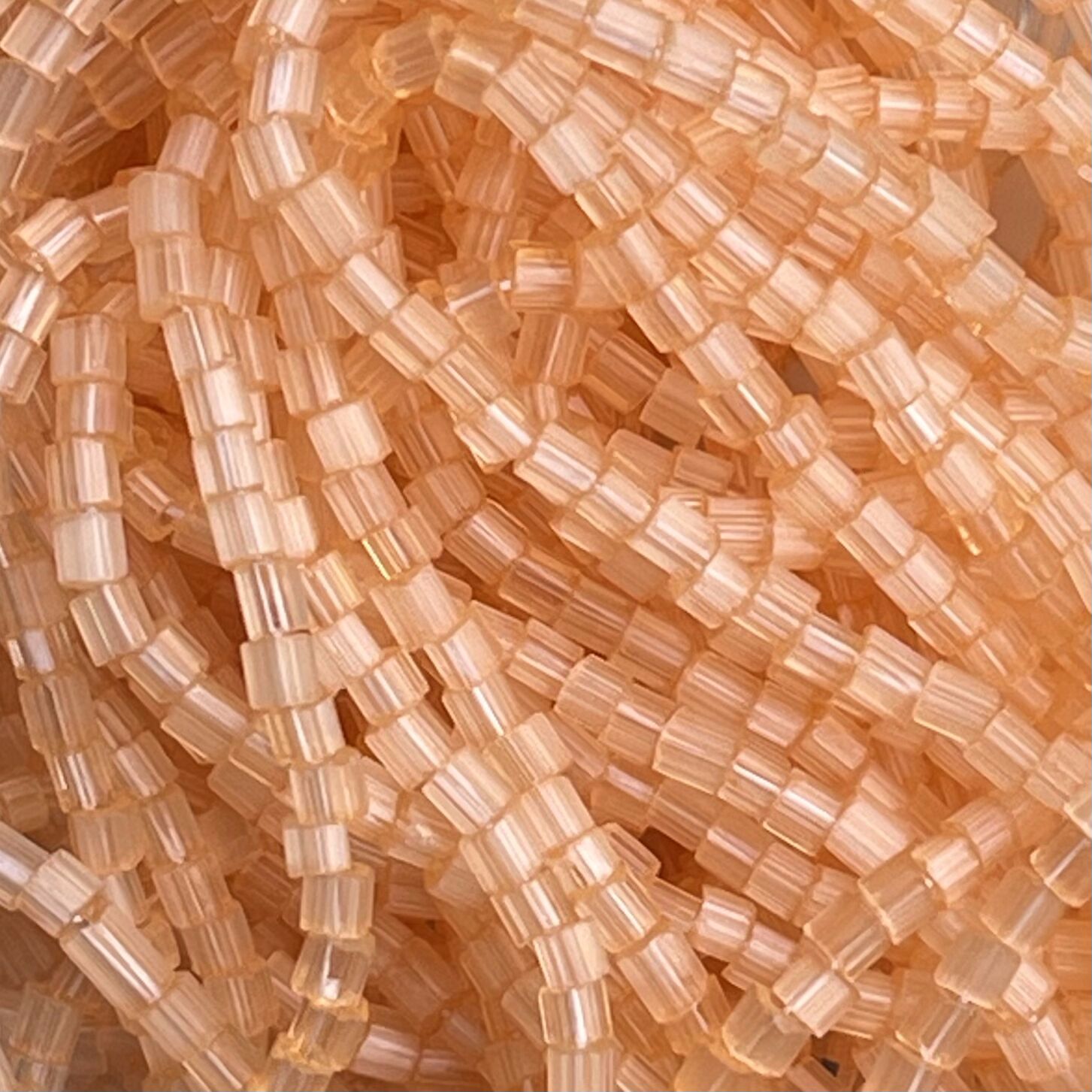 Czech Seed Beads 10/0 2Cut Satin Light Orange SOLGEL Strung - Image 1