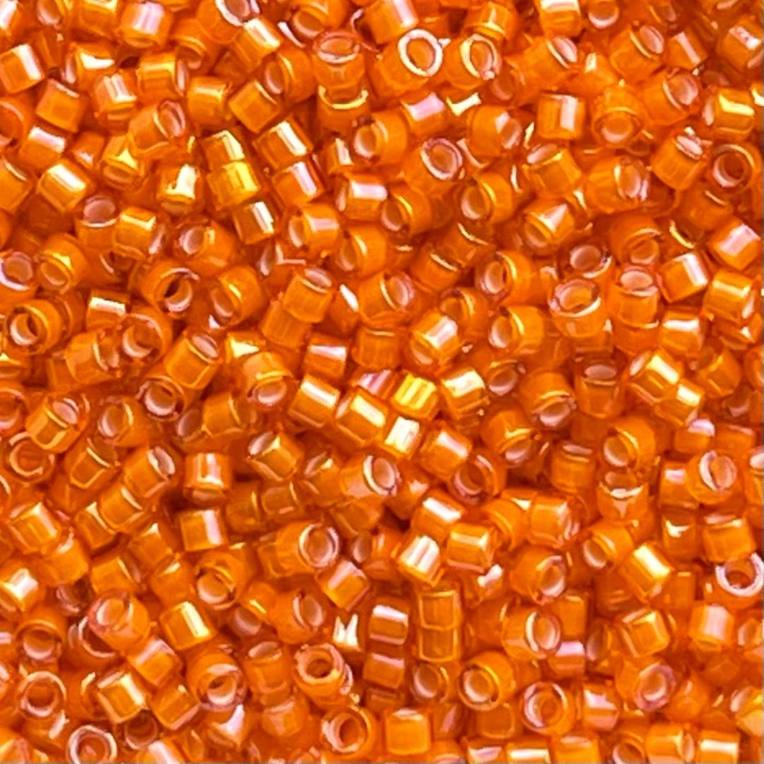 Delica Bead White Lined Orange AB - Image 1