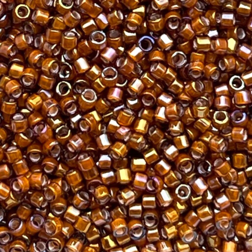 Delica Bead White Lined Dk Topaz AB