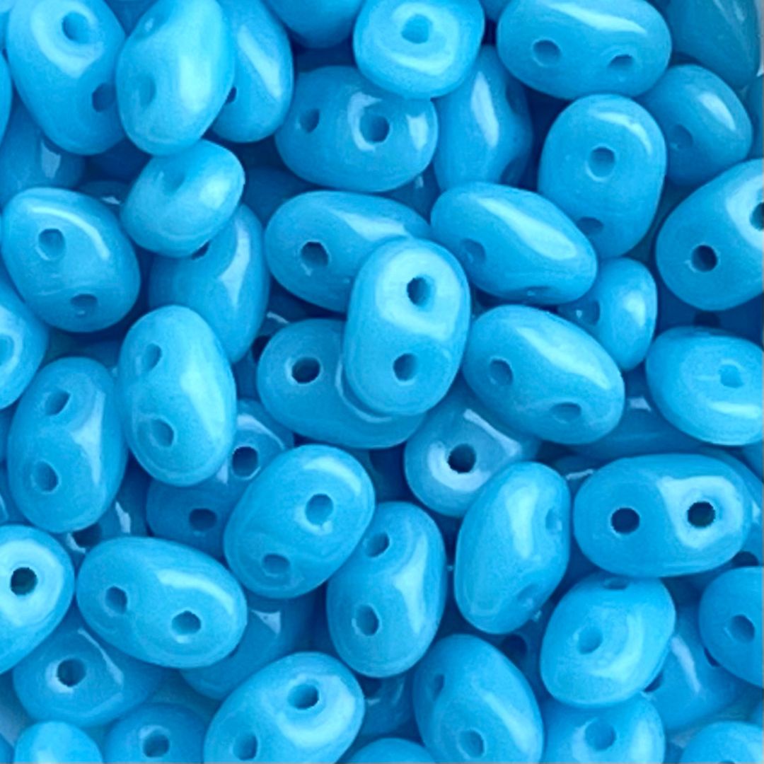 SuperDuo 2x5mm Opaque Turquoise Blue x 10 grs - Image 1