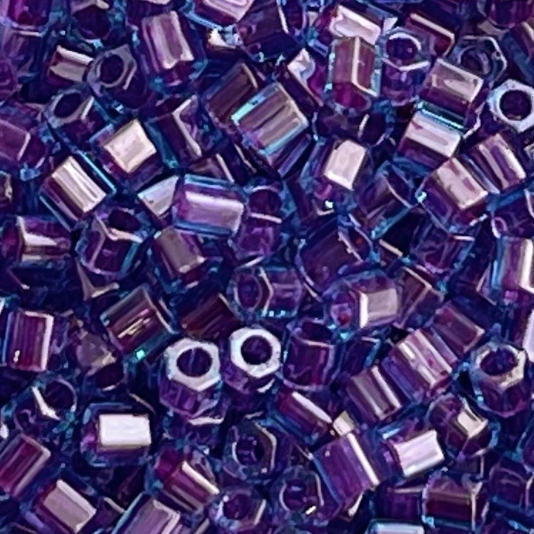 Toho Hexagon #8 Inside Color Aqua Purple Lined - Image 1