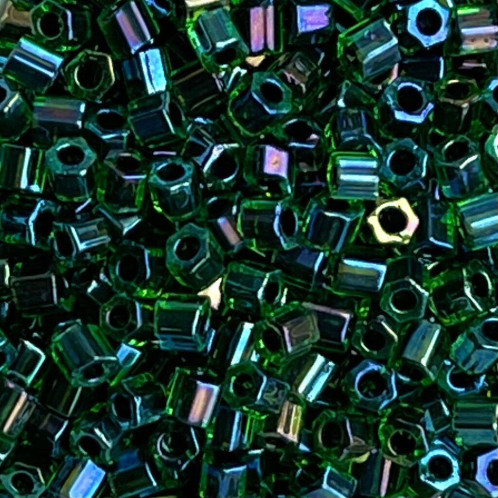 Toho Hexagon #8 InsideColor Rainbow Green/Purple Lined