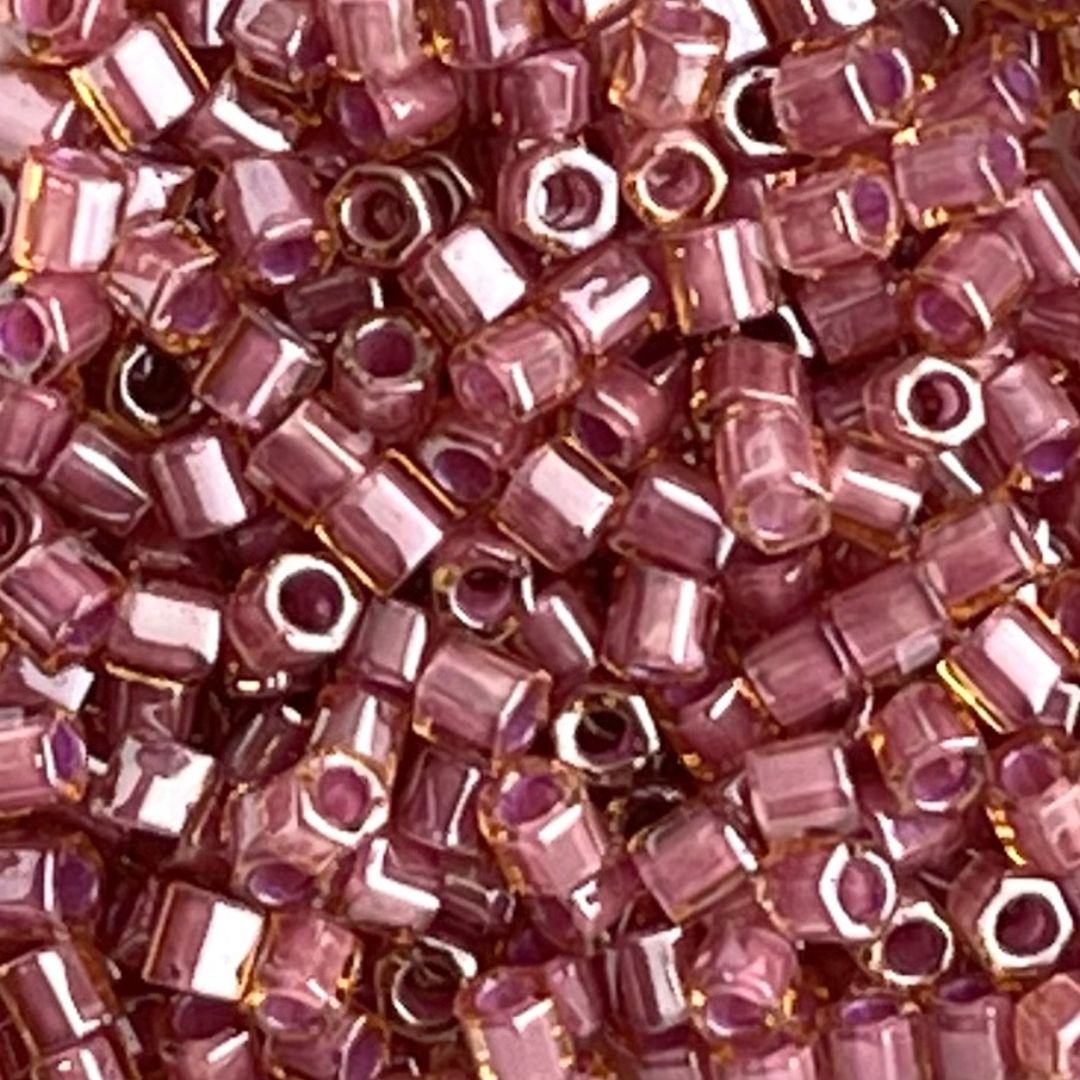 Toho Hexagon #8 Inside Color Lt Topaz Pink Lined - Image 1