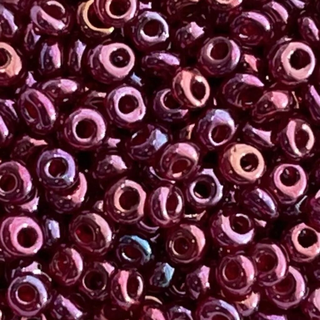 Toho Magatama 3mm Gold-Lustered Raspberry